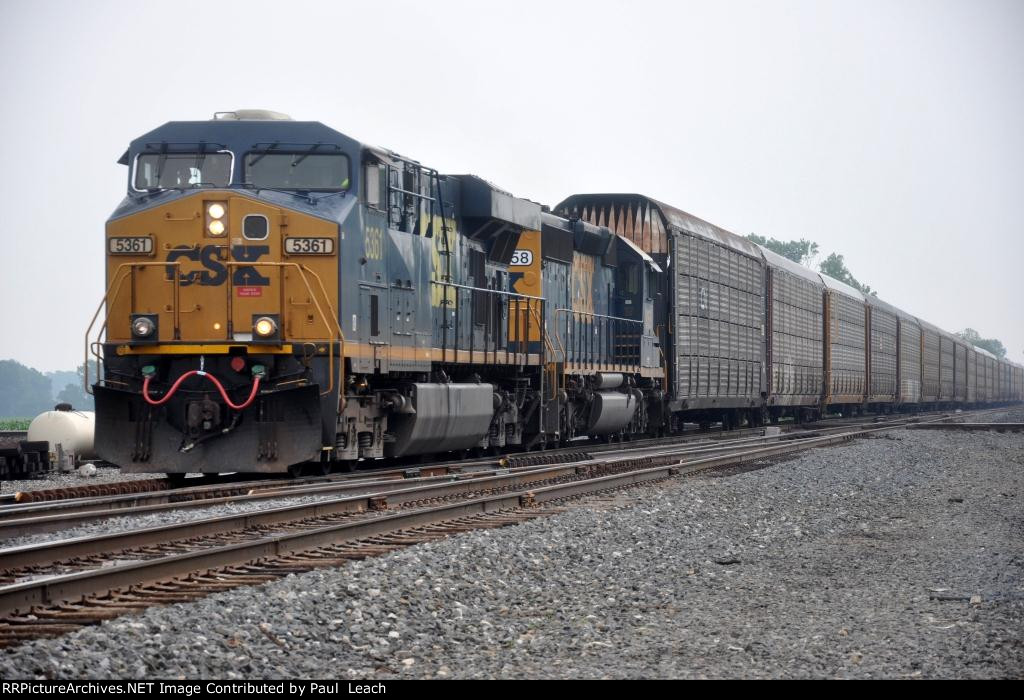 Vehicle train rolls west